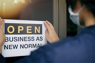 store sign says open business