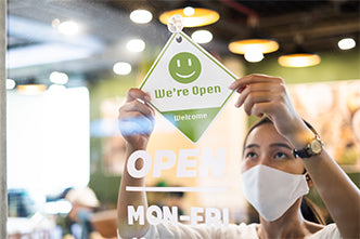 image of woman with open sign