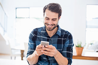image of a man texting