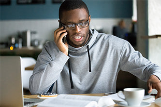 image of man talking on phone to customer