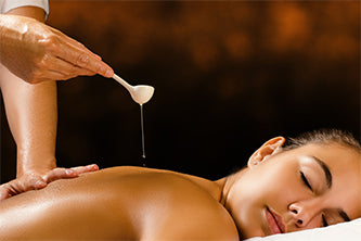 woman receiving back massage