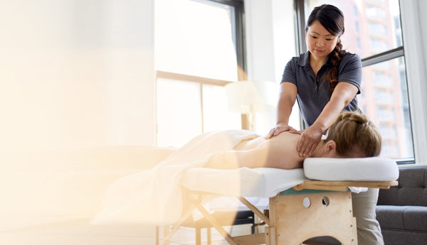 woman receiving back massage