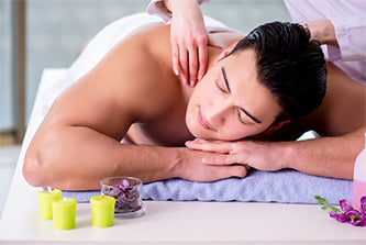 man receiving massage treatment 