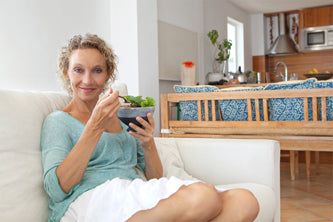 woman eating salad