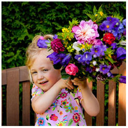 child with flowers