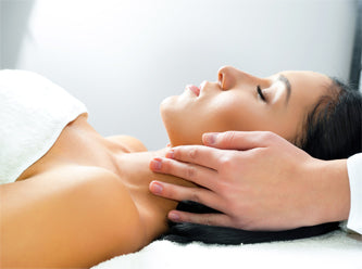 woman being massaged at spa